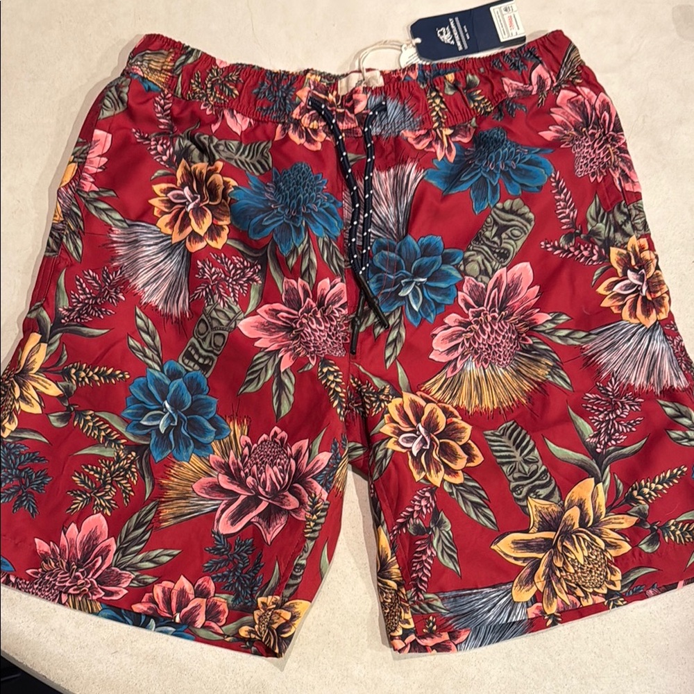 Surfside Supply Red and Blue Board Shorts Vibrant Tropical Design